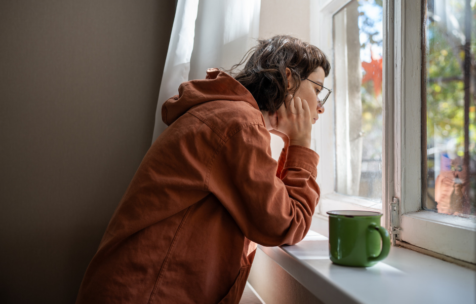 Teenage boy staring out the window-More than a Safe Place for tonight